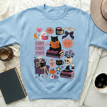 Light blue sweatshirt with Halloween-themed reading and spooky graphics.