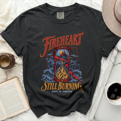 Black t-shirt with "Fireheart Still Burning Queen of Terrasen" text and hourglass graphic.