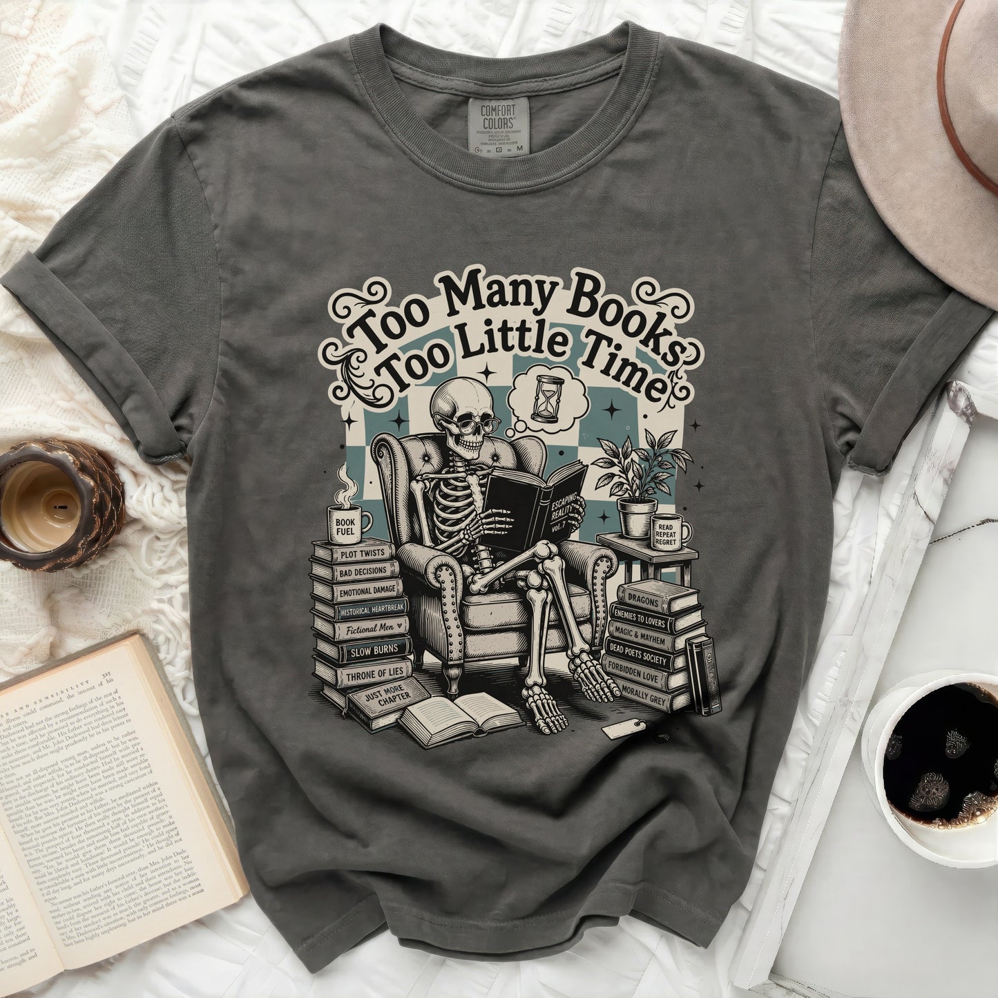 Skeleton reading a book with text "Too Many Books Too Little Time".