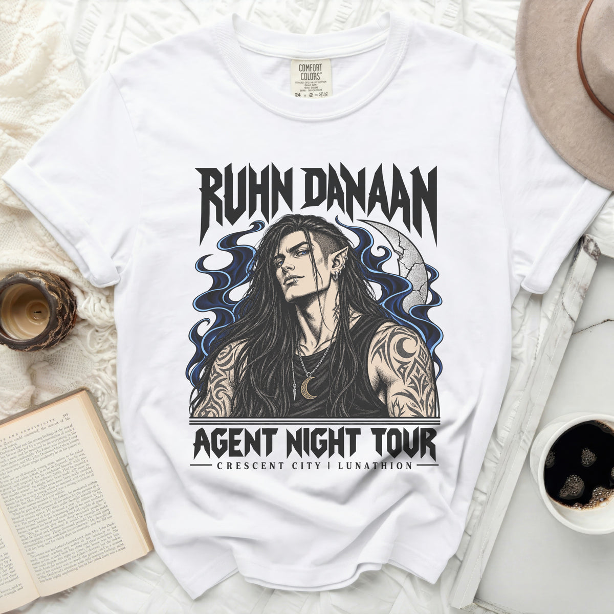 White t-shirt with "Ruhn Danaan Agent Night Tour" graphic featuring a man.