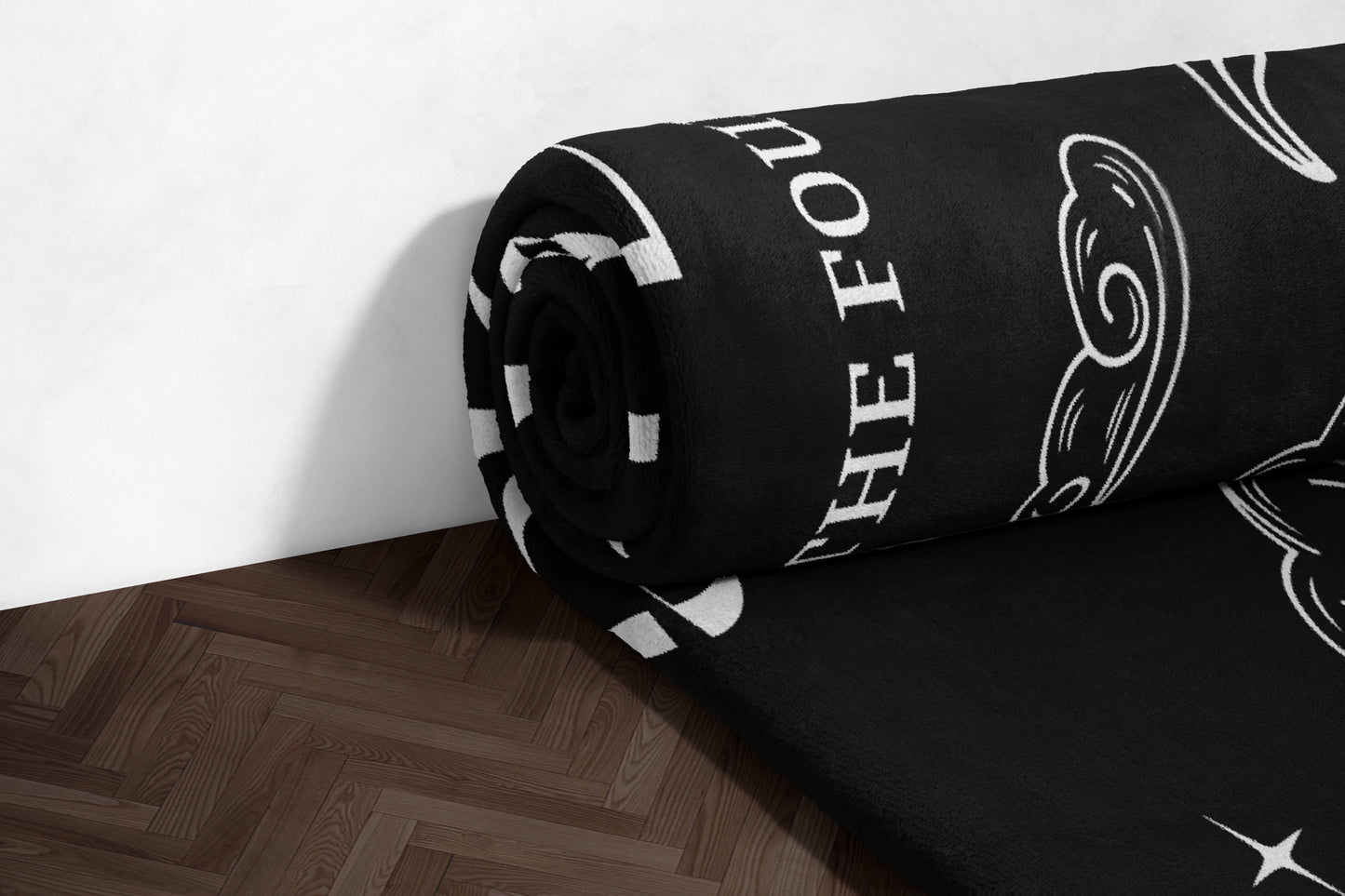 Black and White rolled blanket with text design