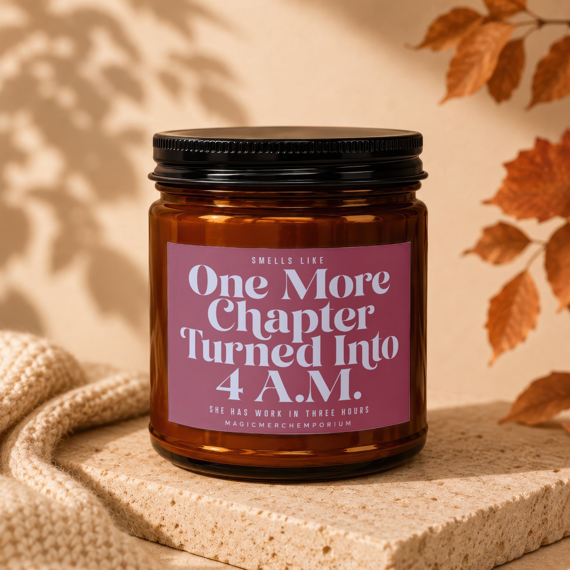 Amber glass candle with label "One More Chapter Turned Into 4 A.M."
