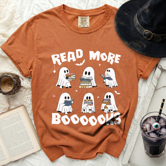 Orange shirt with ghosts reading and "Read More BOOOOOKS" graphic.