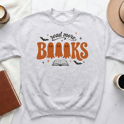 "Read more Books" graphic with ghost letters over an open book.