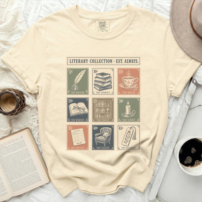 Cream t-shirt with literary collection stamp graphics and text.
