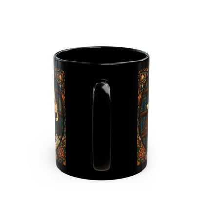 Black mug featuring a stained glass design with roses and a window scene.