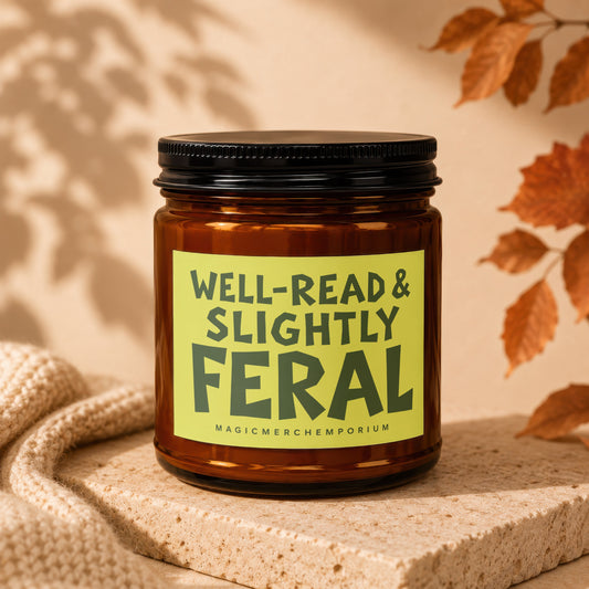Amber jar candle with a "WELL-READ & SLIGHTLY FERAL" label on a stone surface.