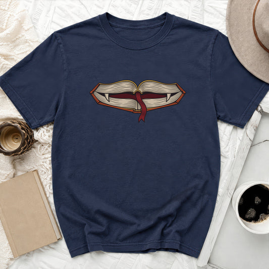 Dark blue t-shirt with an open book graphic featuring fangs and a ribbon.