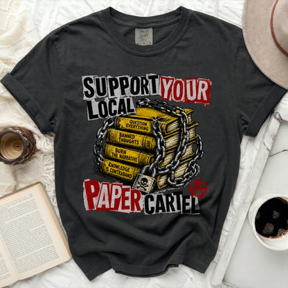 T-shirt with "SUPPORT YOUR LOCAL PAPER CARTEL" text over stacked books.