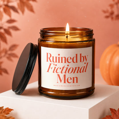 Amber candle with lit wick and lid off, reads "Ruined by Fictional Men".