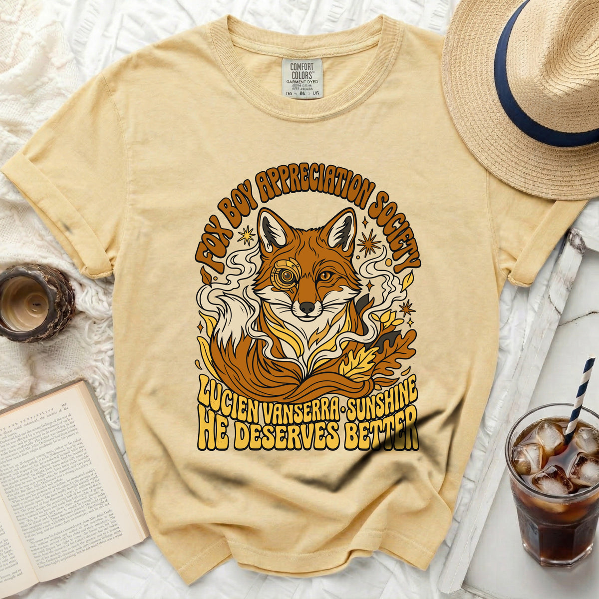 Yellow t-shirt with a fox graphic and text "FOX BOY APPRECIATION SOCIETY".