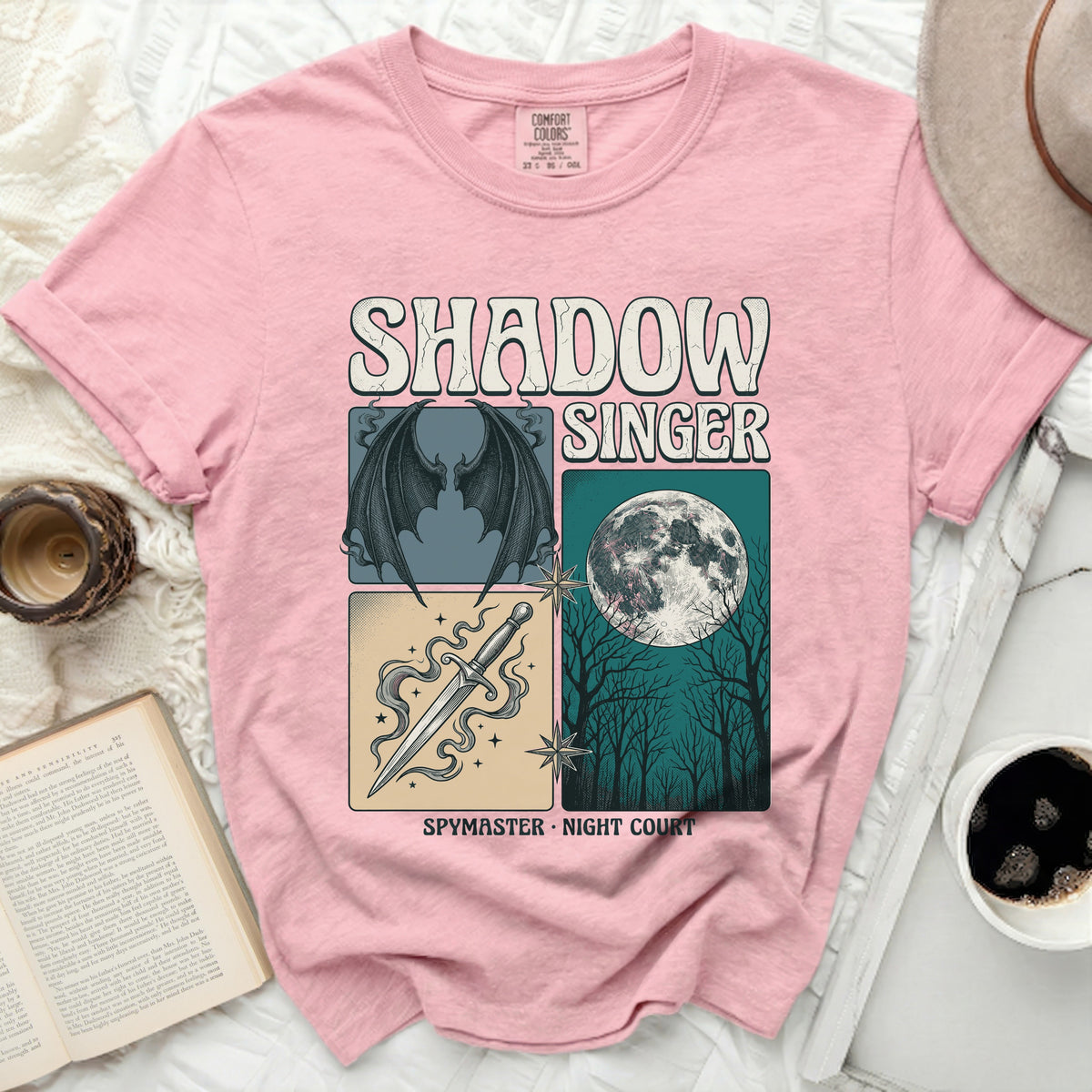 Pink t-shirt with "Shadow Singer Spymaster Night Court" graphic.