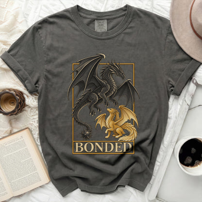 Dark grey t-shirt with black and gold dragons, text reads "BONDED".