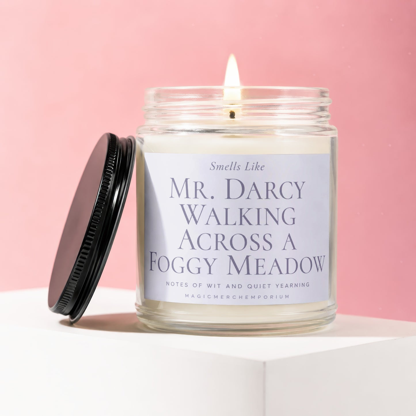 Glass jar candle with "Mr. Darcy Walking Across a Foggy Meadow" label.