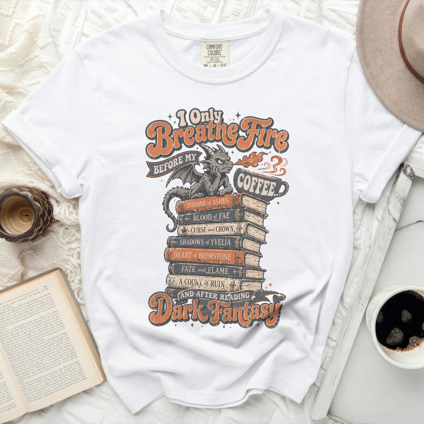 White t-shirt with "Breathe Fire Before My Coffee and After Reading" dark fantasy text.