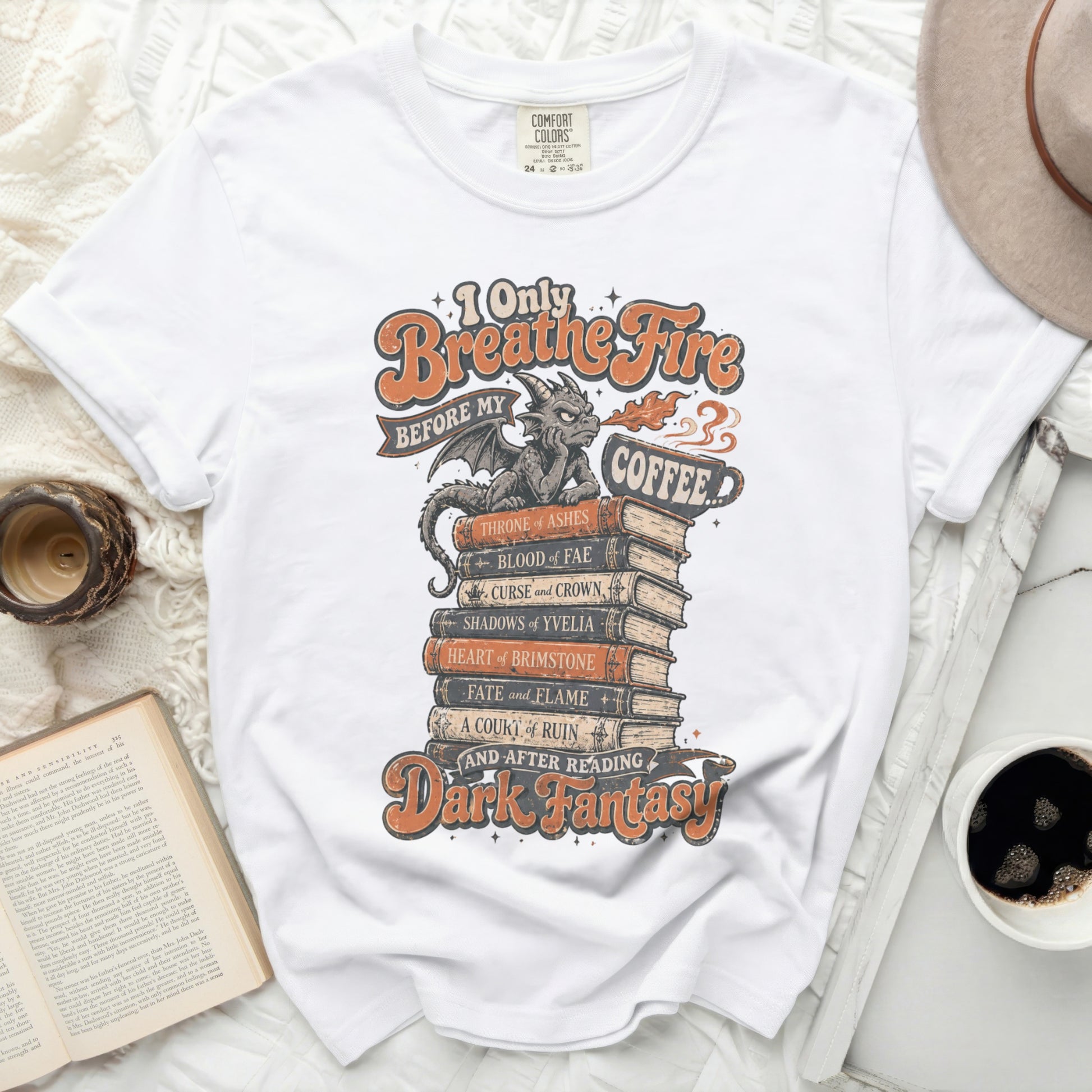 White t-shirt with "Breathe Fire Before My Coffee and After Reading" dark fantasy text.