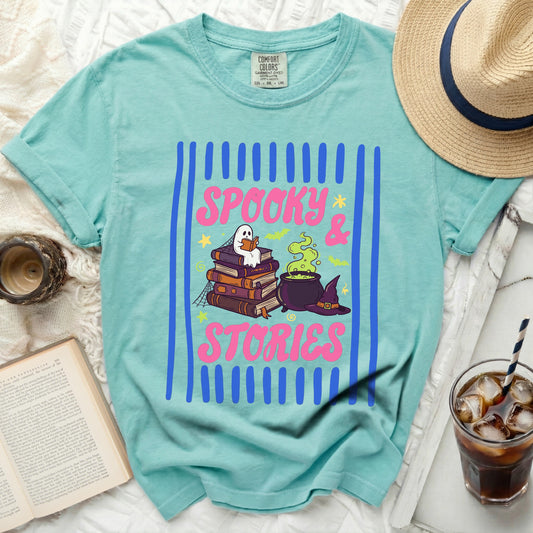 Teal t-shirt with "Spooky & Stories" graphic and ghost reading books.