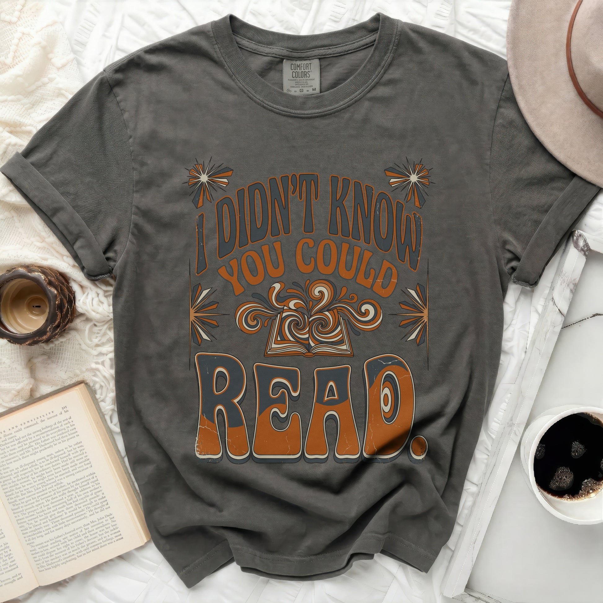 Charcoal t-shirt with "I didn't know you could read" and open book graphic.