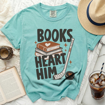 Aqua t-shirt with "Books Heart Him" text and hockey puck.