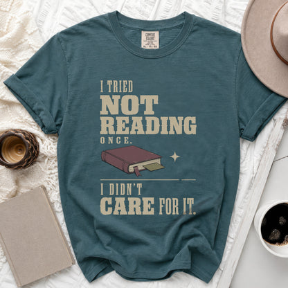 Teal t-shirt with text "I tried not reading once. I didn't care for it."