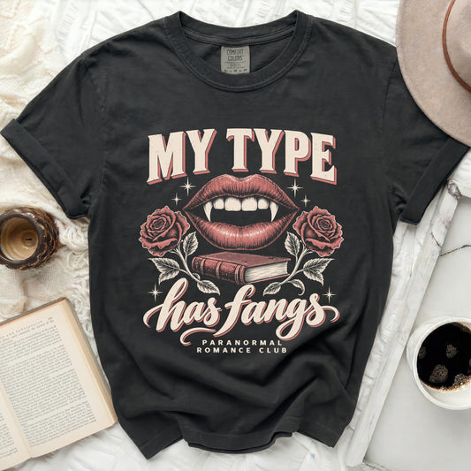 Dark t-shirt with "My Type Has Fangs" and vampire lips graphic.