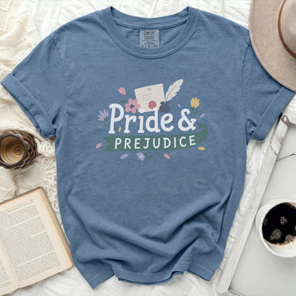 Blue t-shirt with "Pride & Prejudice" text and floral design.