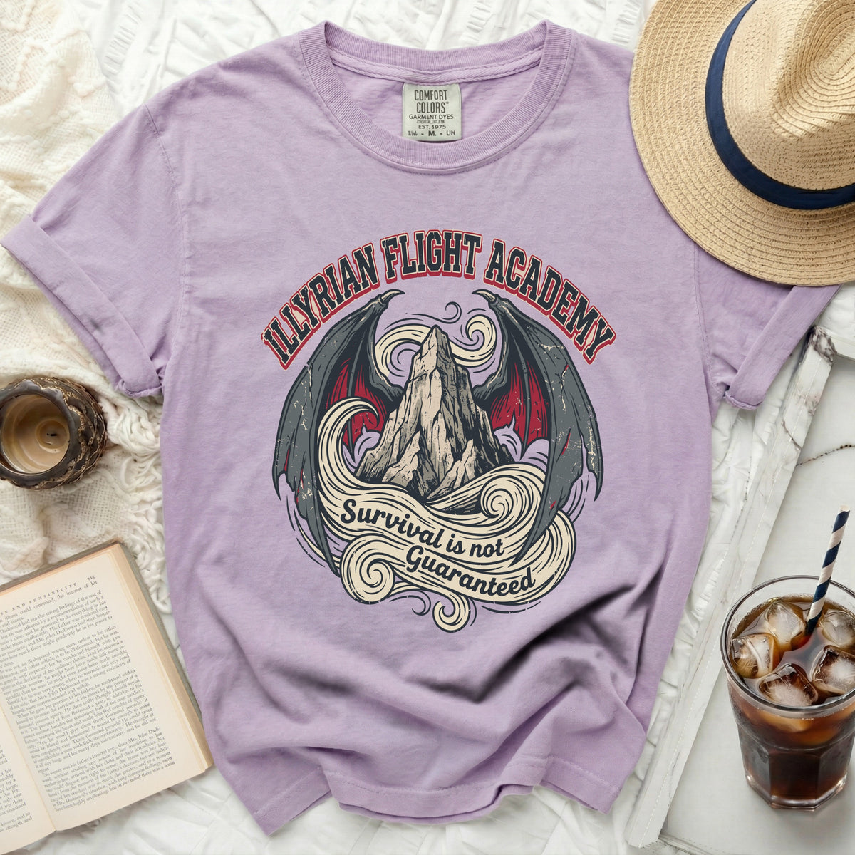 Purple t-shirt with "Illyrian Flight Academy" and winged mountain graphic.