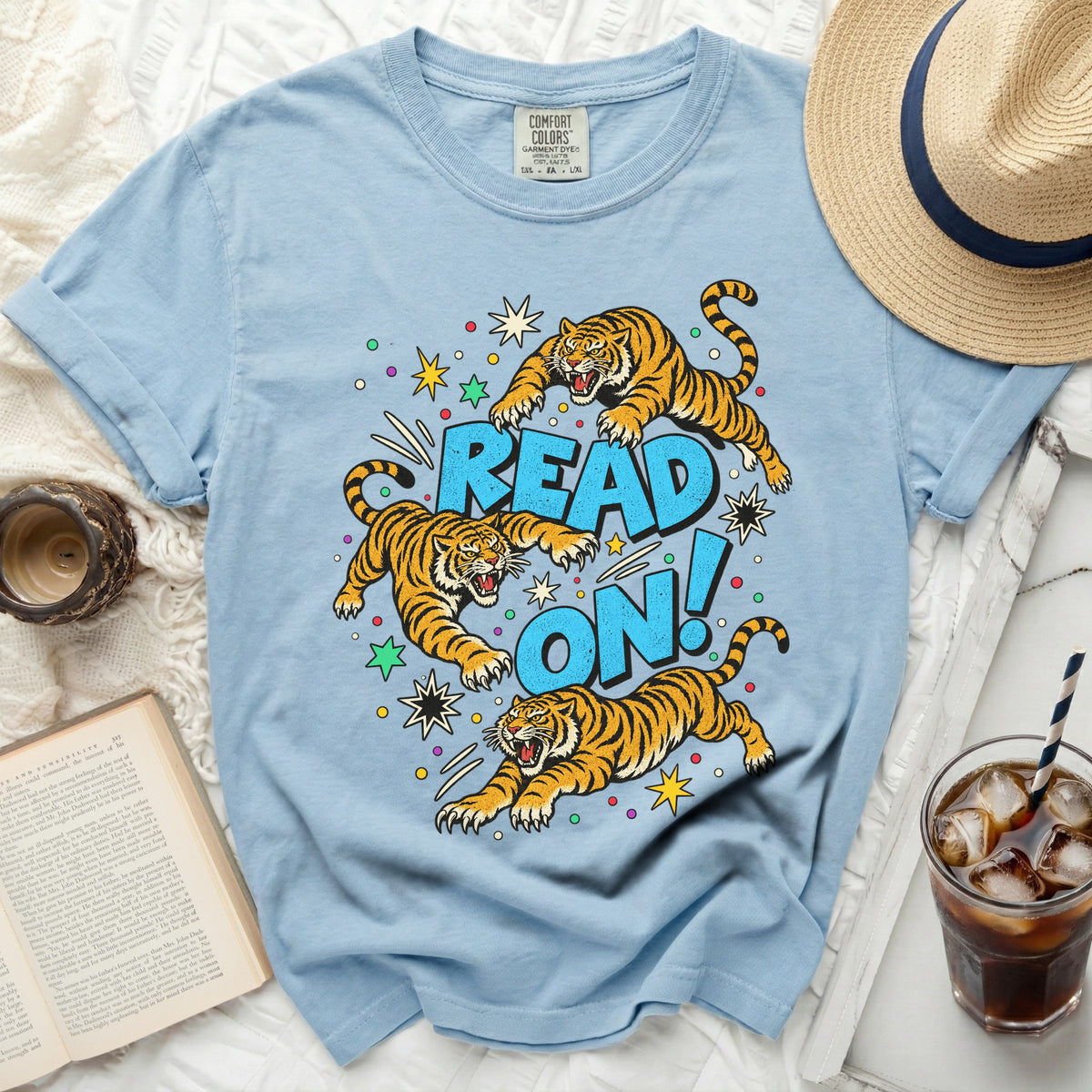 Light blue t-shirt with three tigers and "READ ON!" text graphic.