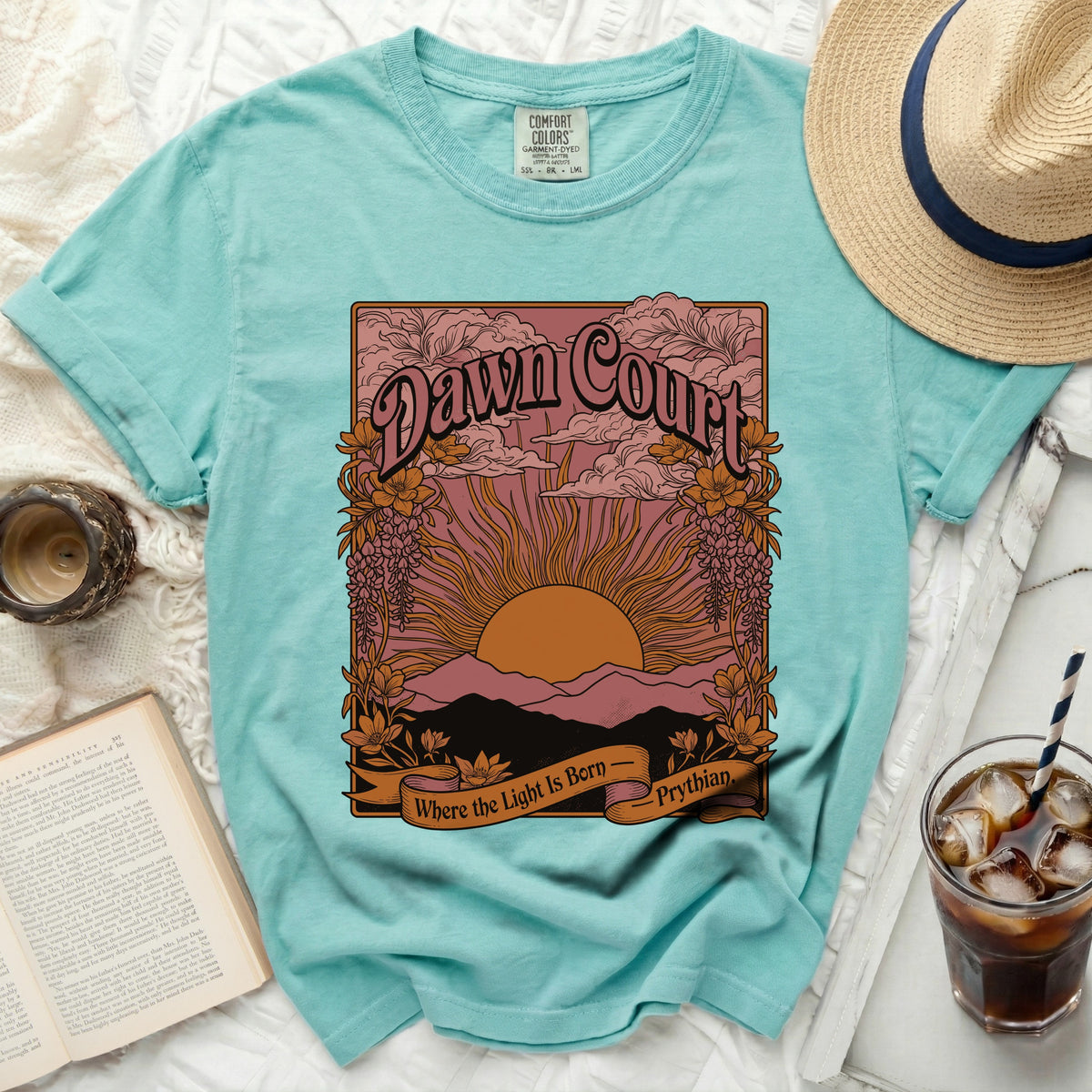 Teal t-shirt with "Dawn Court" and sun graphic, "Where the Light Is Born - Prythian".