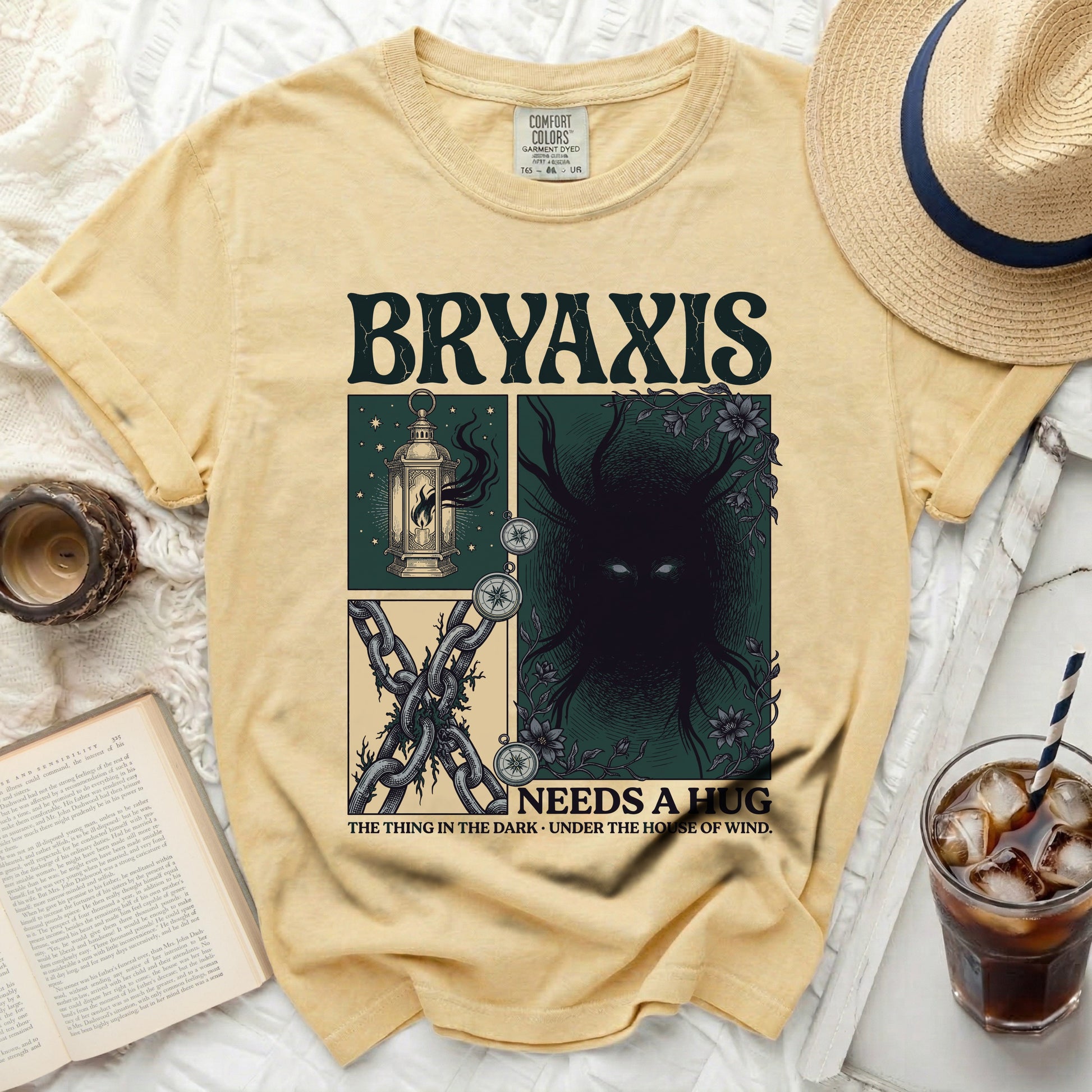 Bryaxis graphic tee with lantern, chains, and dark creature.