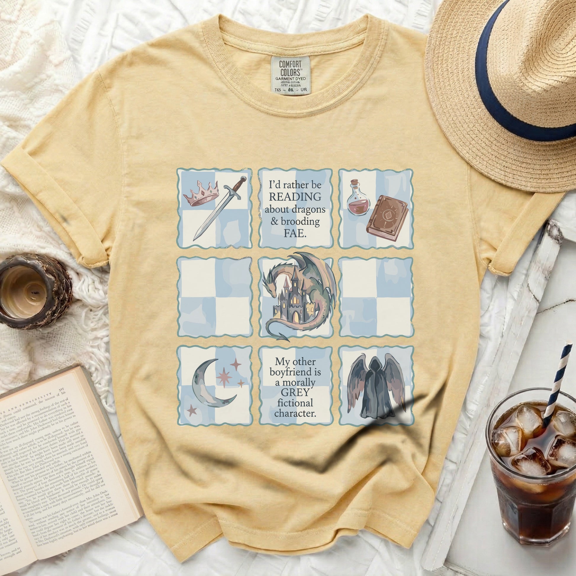 Yellow t-shirt with grid design and fantasy quotes.