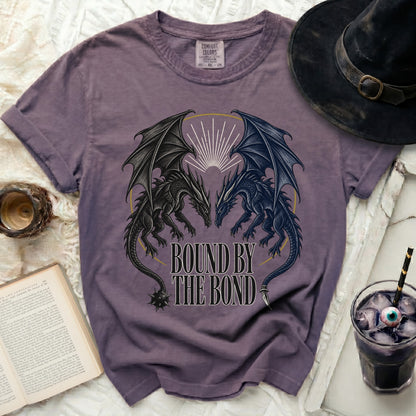 Purple t-shirt with two dragons and text "BOUND BY THE BOND".
