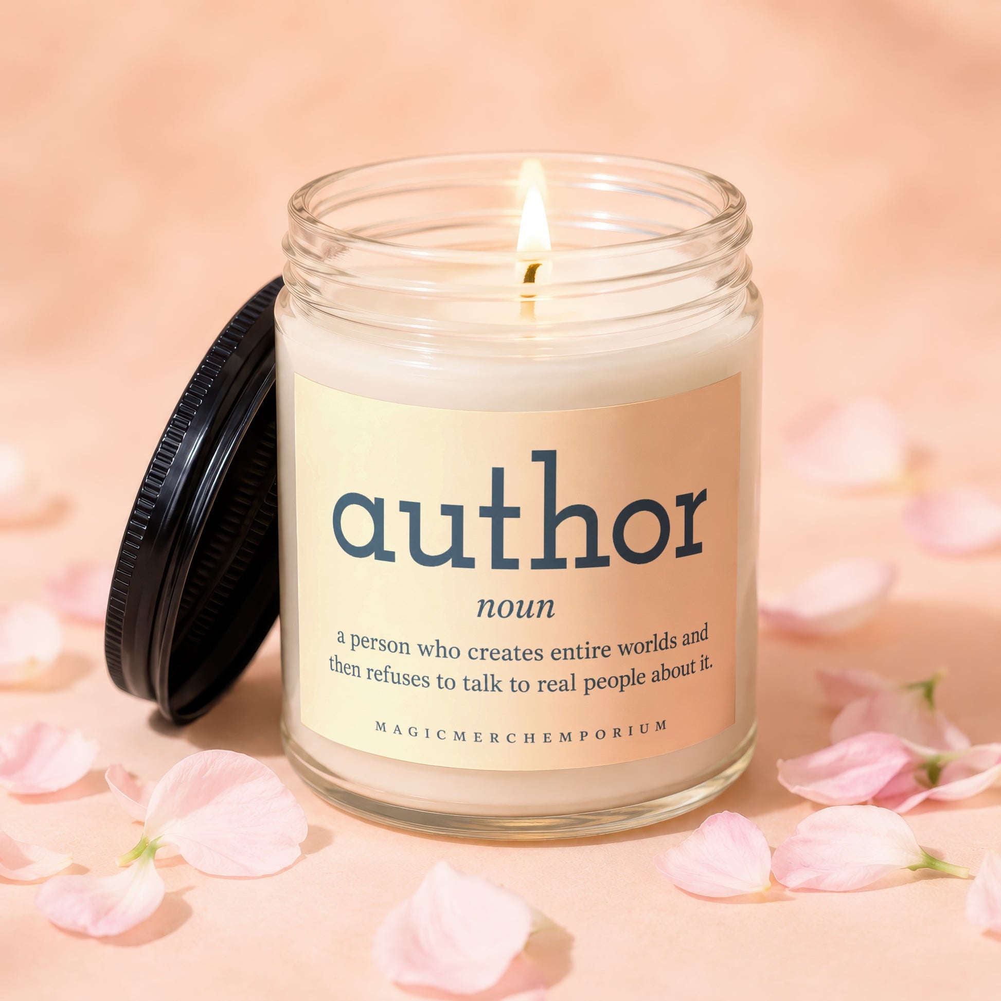 Lit candle with "author" definition: "A person who creates entire worlds and then refuses to talk to real people about it."