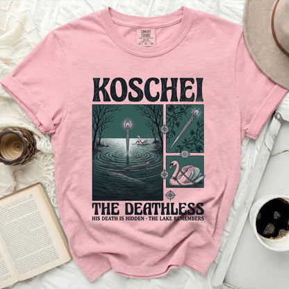 Pink t-shirt with "KOSCHEI THE DEATHLESS HIS DEATH IS HIDDEN THE LAKE REMEMBERS" graphic.