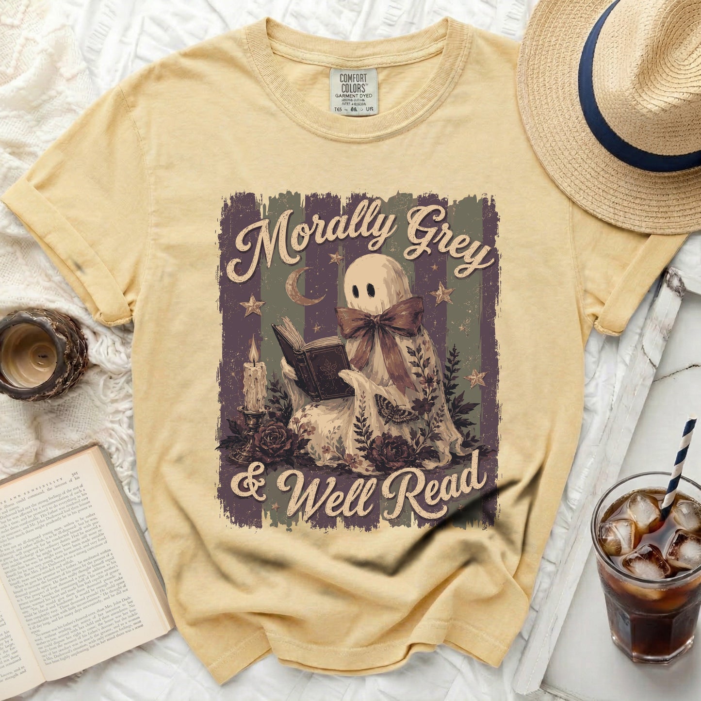 Yellow t-shirt with "Morally Grey & Well Read" ghost graphic.