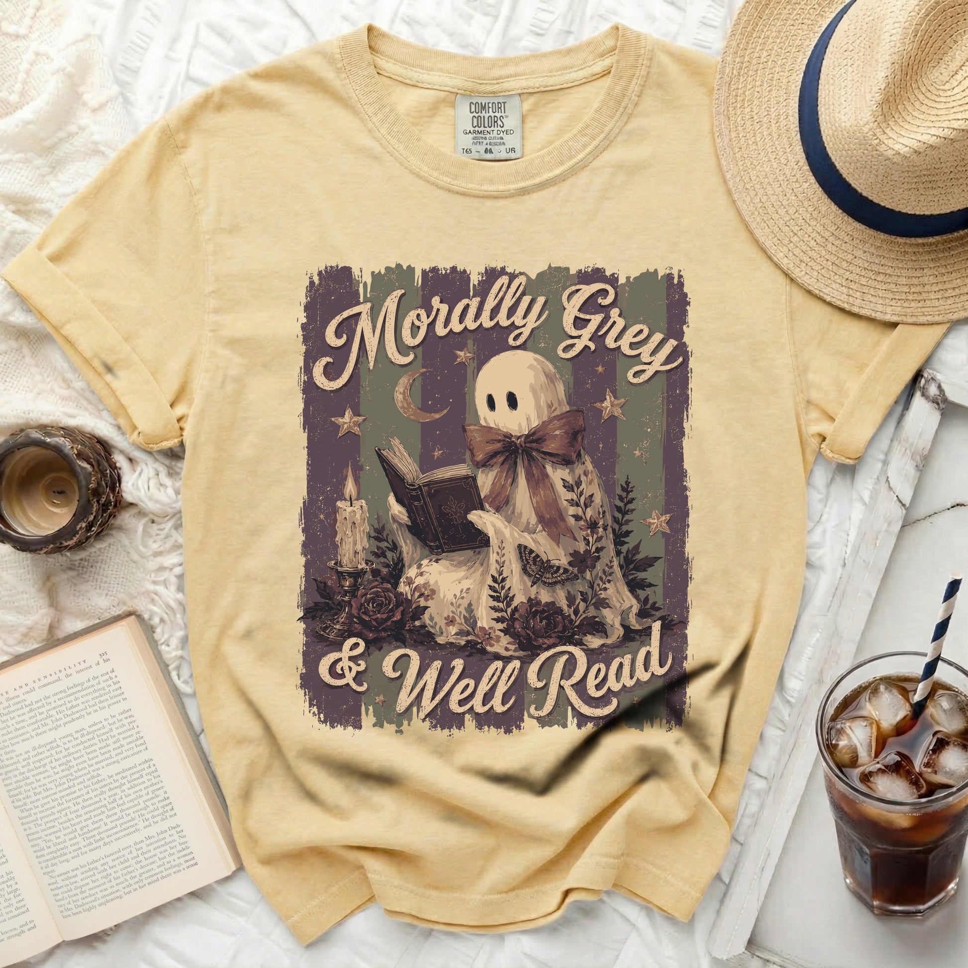 Yellow t-shirt with "Morally Grey & Well Read" ghost graphic.