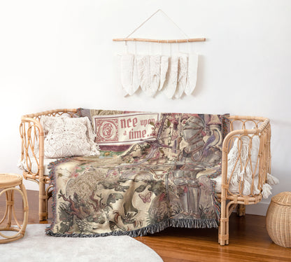 a cozy living space with a woven bench, a decorative blanket, and a wall hanging.