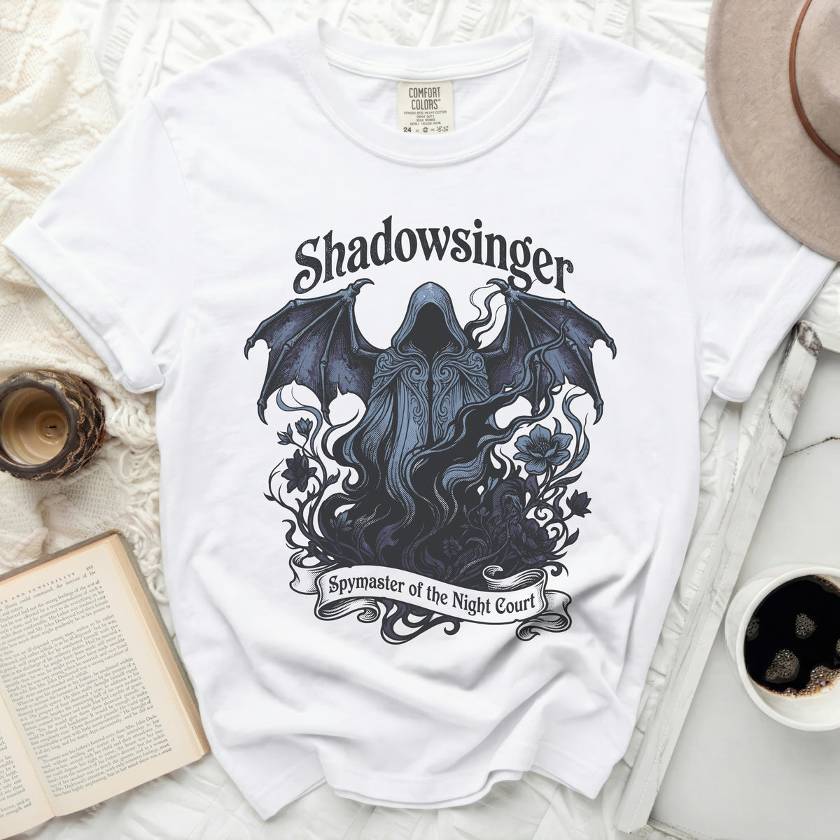 White t-shirt with "Shadowsinger Spymaster of the Night Court" graphic.