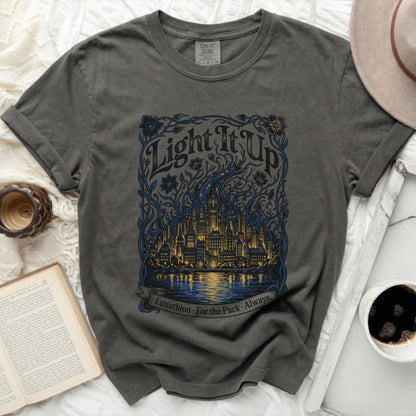 Dark grey t-shirt with "Light It Up" city design and ribbon.