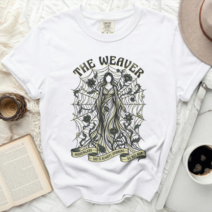 The Weaver shirt with graphic of woman, cobwebs, and text.