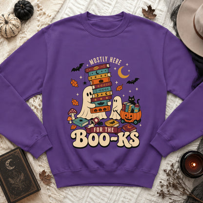 Purple sweatshirt with ghosts, books, bats, and "Mostly Here For The Boo-Ks" text.