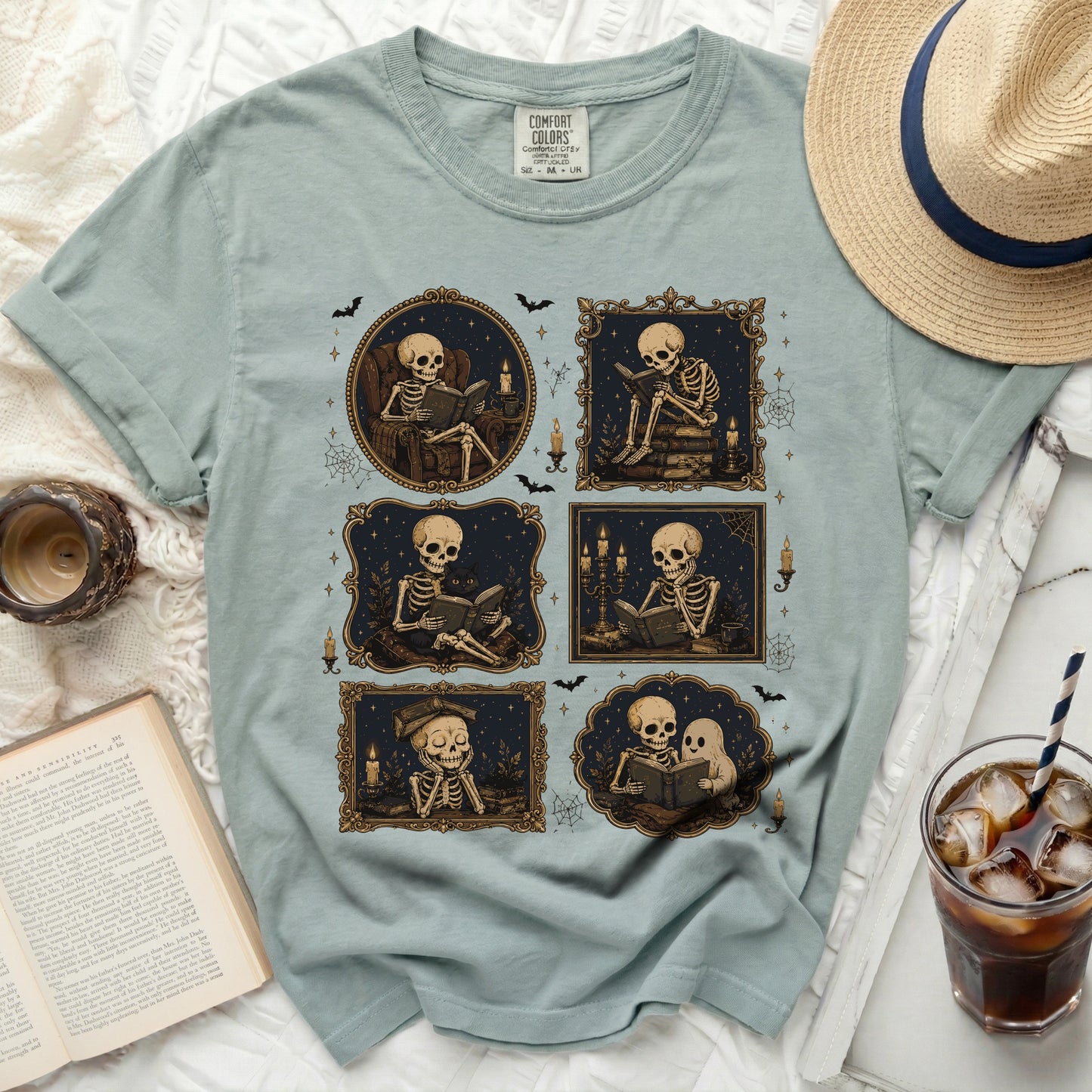 T-shirt with six framed illustrations of skeletons reading books.
