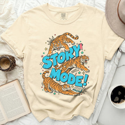 T-shirt with tigers leaping around the words "STORY MODE!".