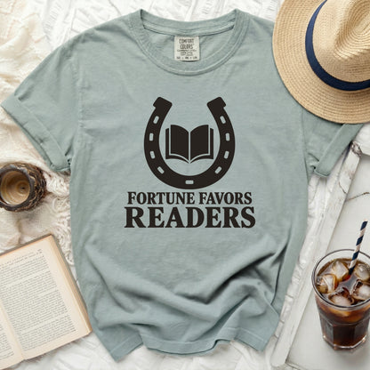 Light green t-shirt with "Fortune Favors Readers" and horseshoe graphic.