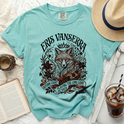 Aqua t-shirt with Eris Vanserra, fox, crown, and ribbon design.