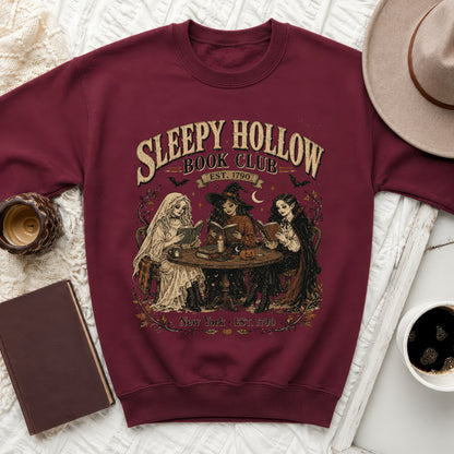Burgundy sweatshirt with Sleepy Hollow Book Club graphic and three witches reading.