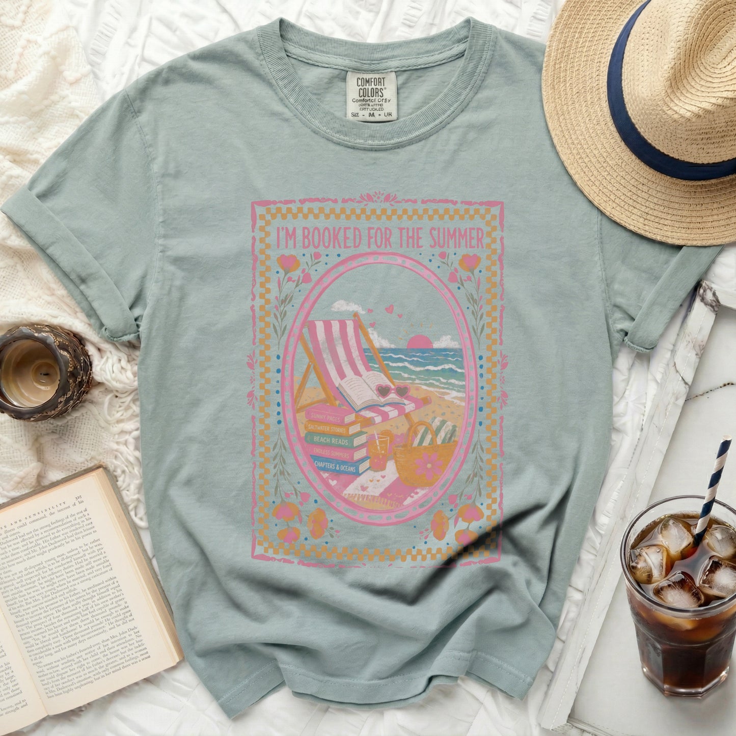 T-shirt with "I'm Booked for the Summer" text and beach scene graphic.