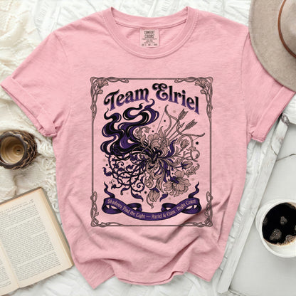 Pink t-shirt with "Team Elriel" and floral design featuring bows and arrows.