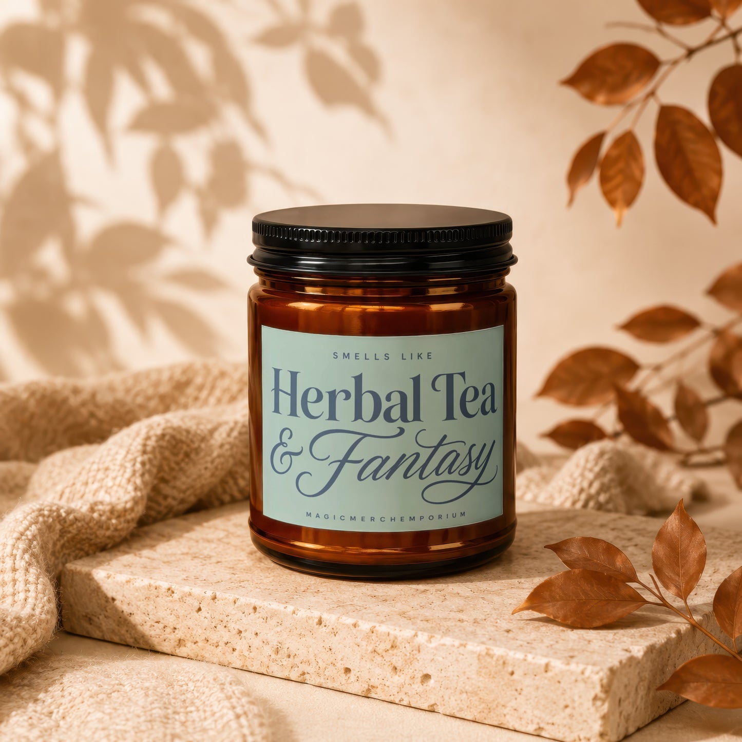 Amber candle with "Herbal Tea & Fantasy" label by Magicmerchempòrium.