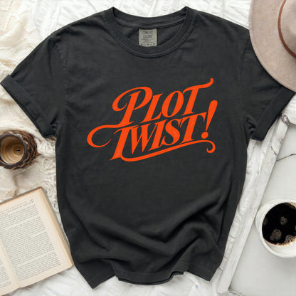 Dark gray t-shirt with bright orange "Plot Twist!" graphic